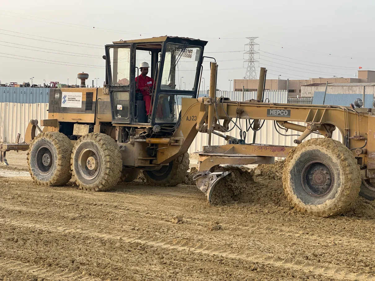 East Hope Contracting motor grader on a road construction site in Dammam