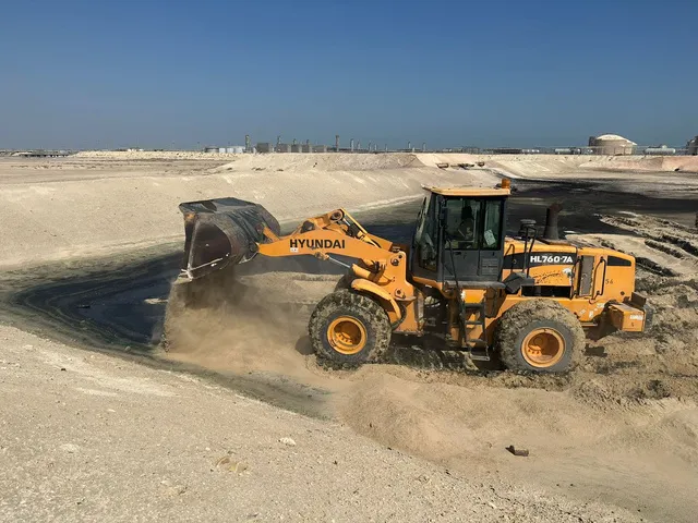 Wheel loader excavating at an industrial site near Jubail