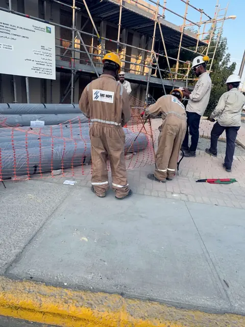 Pipe works inside a barricaded worksite
